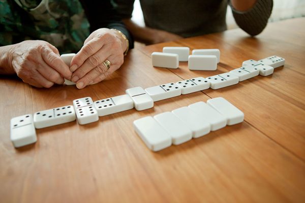 mother-and-daughter-playing-dominoes
